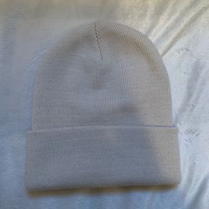 Cream coloured toque
